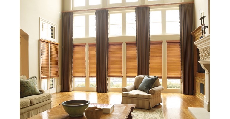 San Diego great room with wooden blinds and full-length draperies.